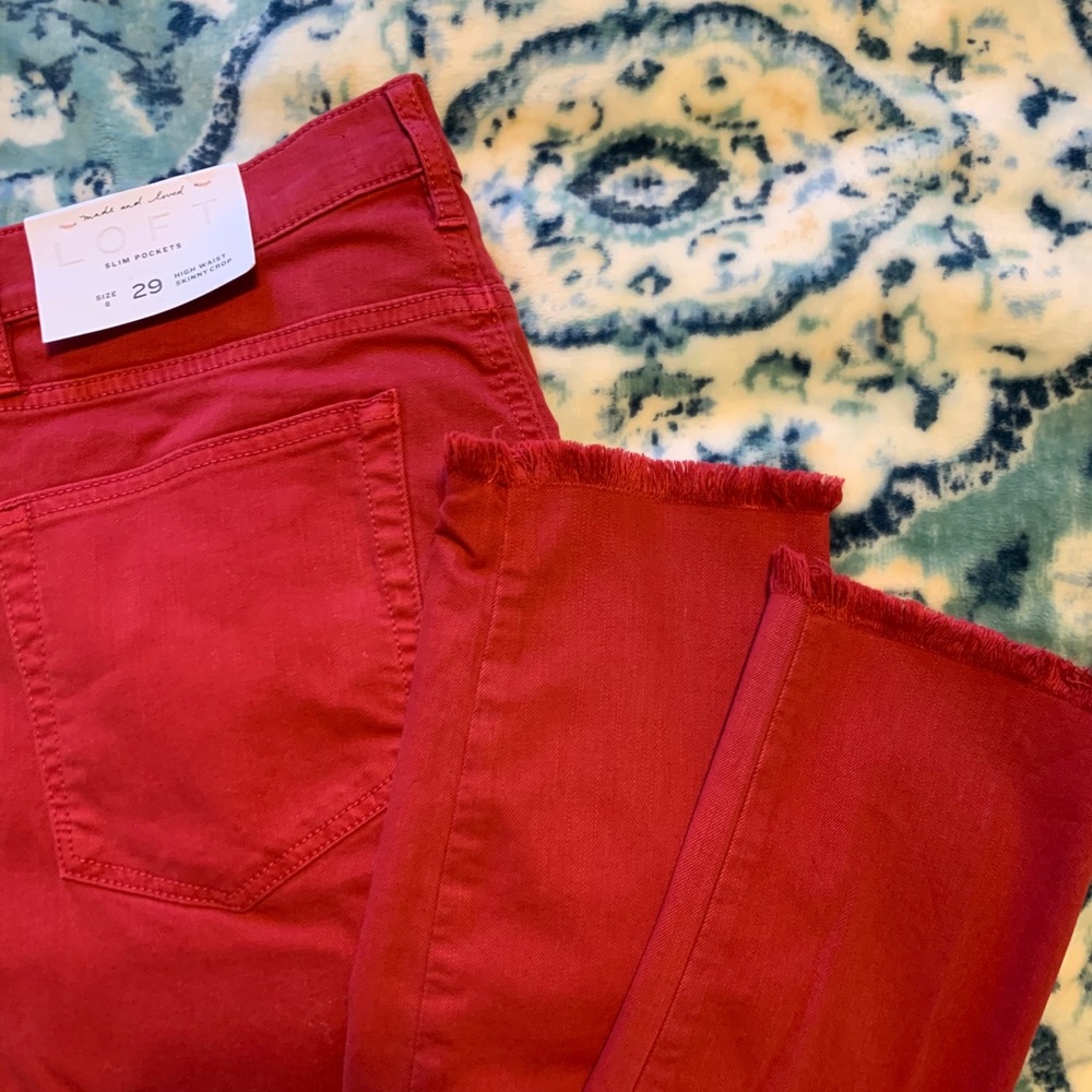 Red jeans with fringe bottoms size 8